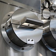 Stainless steel glovebox isolator with stainless steel glove port and port cover